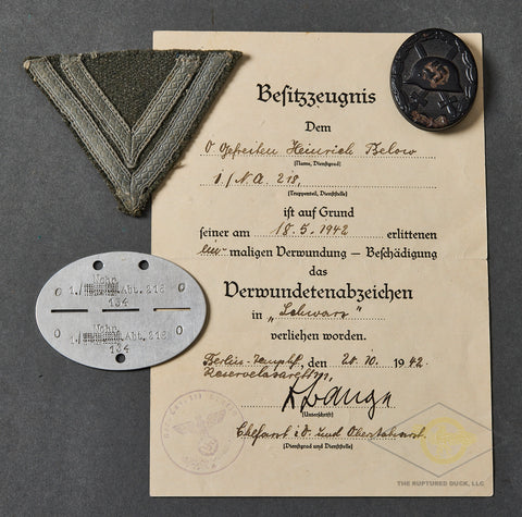 German WWII Black Wound Badge with Document, Chevron and Dog Tag Grouping